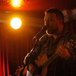Paul Loughran on acoustic guitar and lead voice