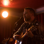 Paul Loughran on acoustic guitar and lead voice